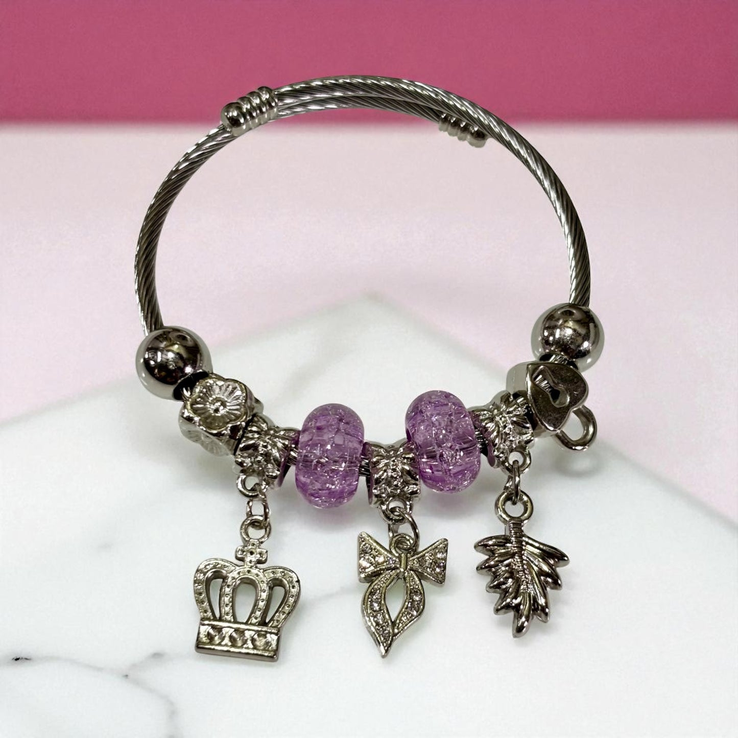 Trendy Silver-Tone Charm Bracelet with Crown, Bow & Leaf Charms