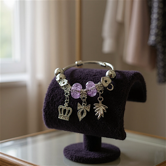 Elegant Silver Tone Charm Bracelet.