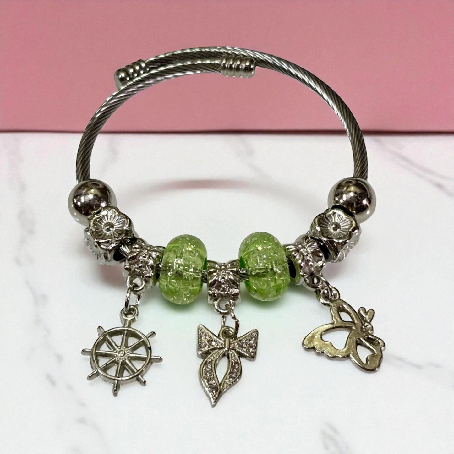 Silver Tone Charm Bracelet with Green Beads.