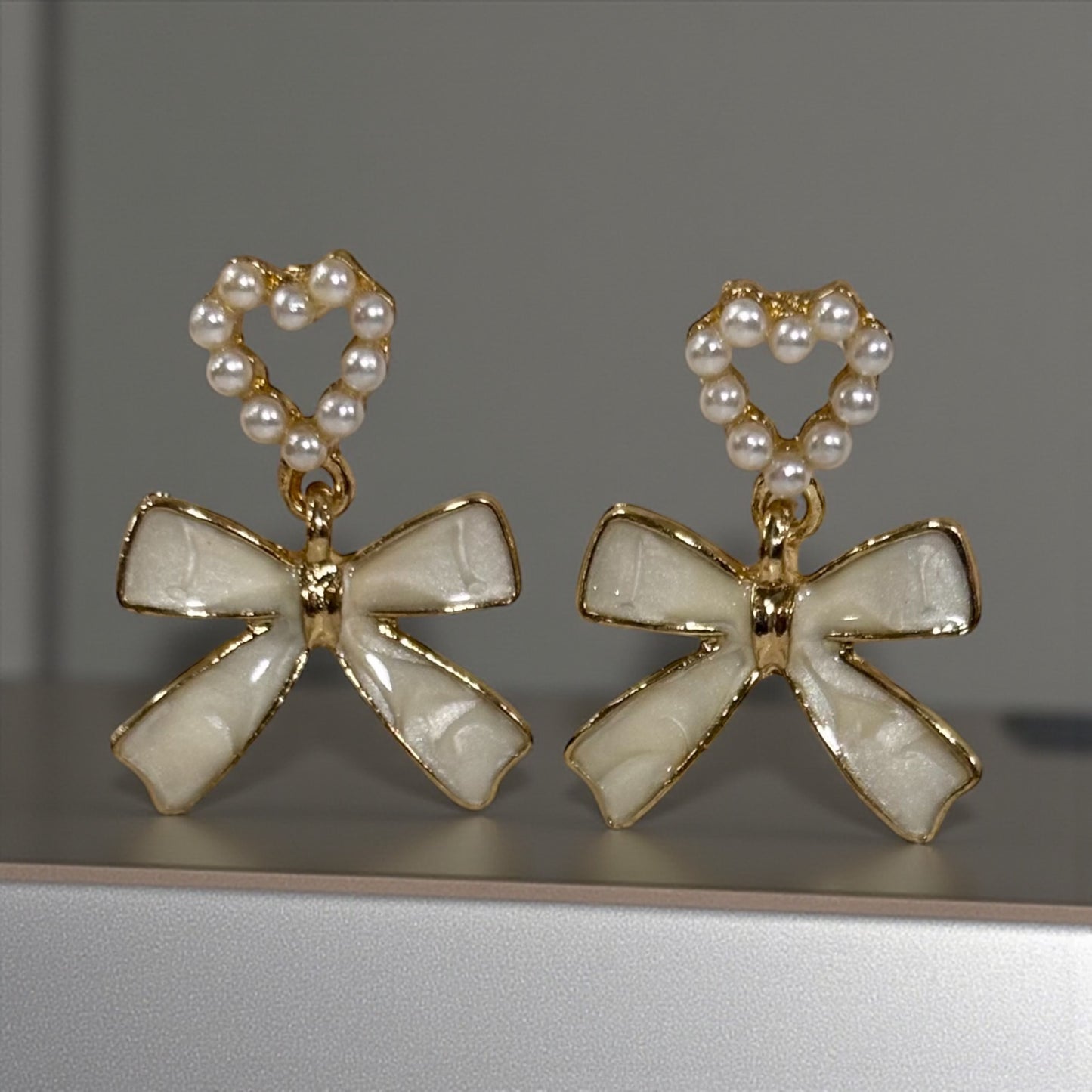 Pearl Heart and Bow Drop Earrings.